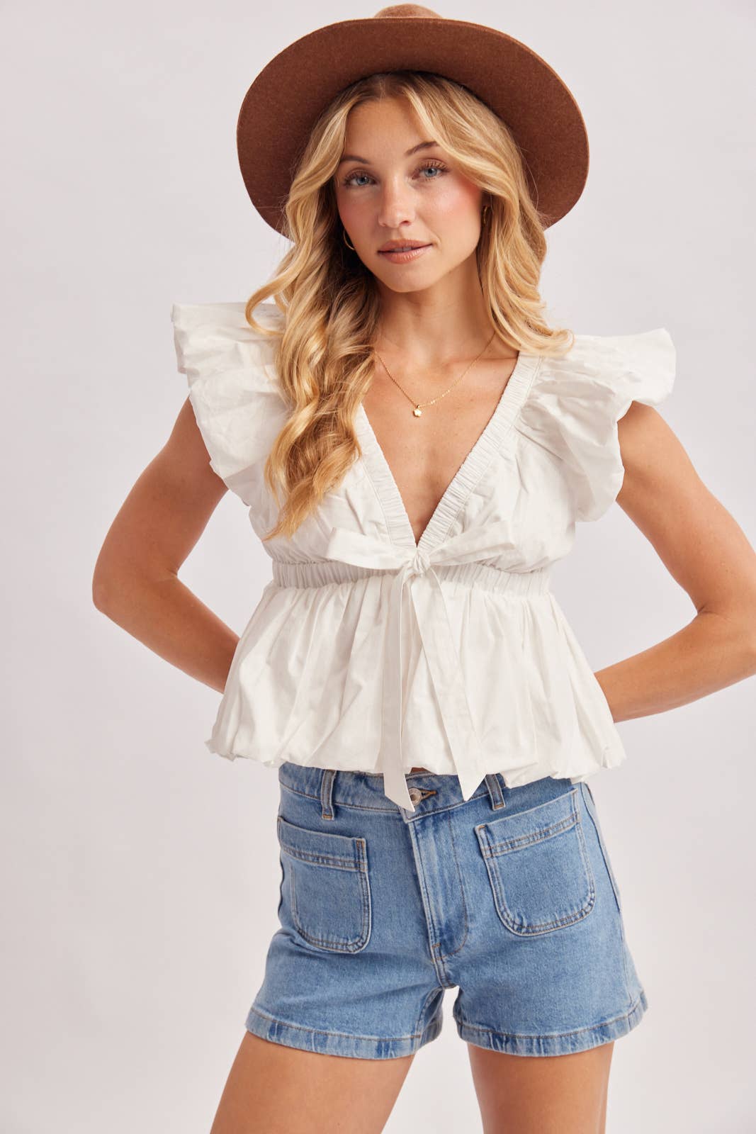 Deep V-Neck Ribbon Front Pleated Peplum Blouse