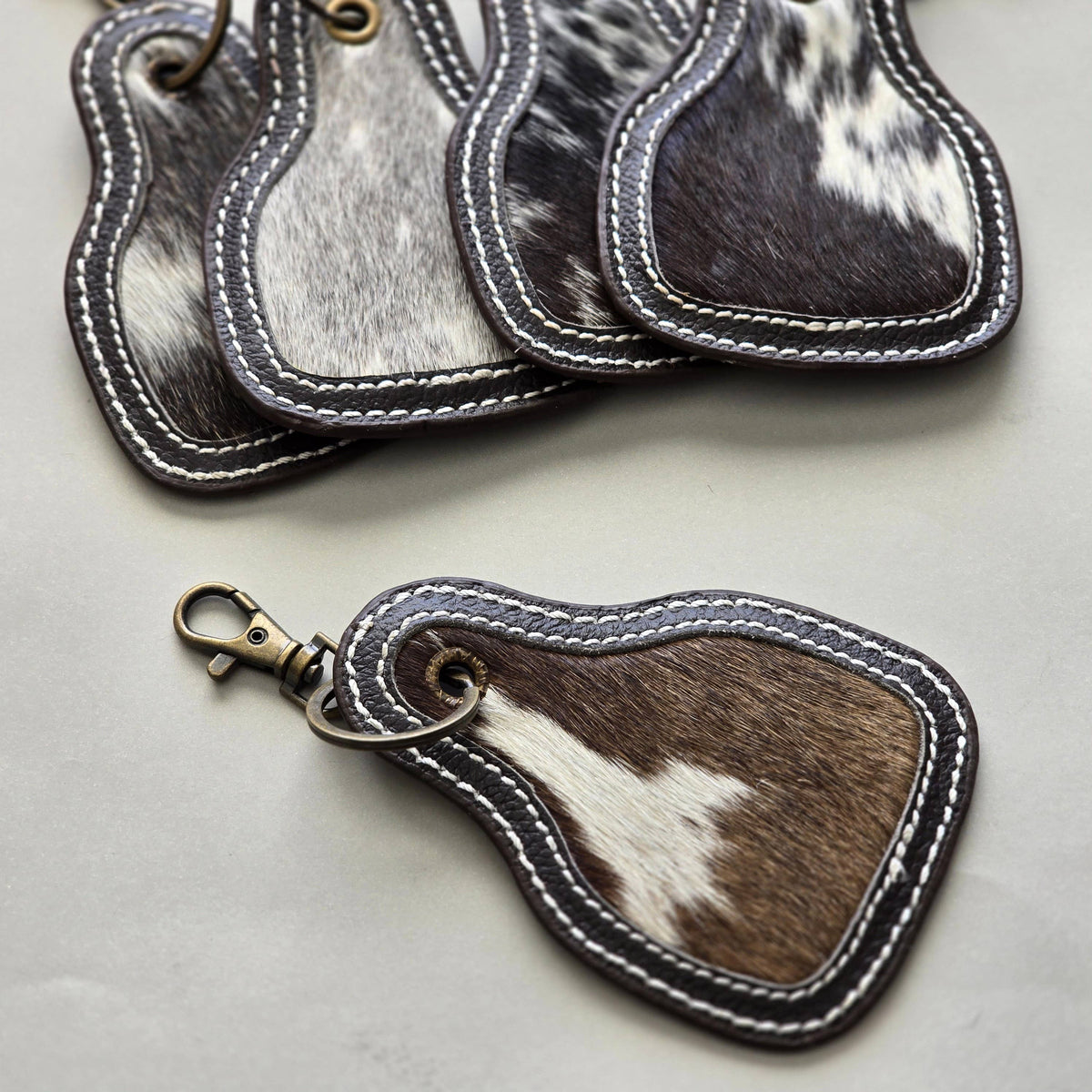 Hair-On Cowhide Keychain – Cow Tag with Leather Borders