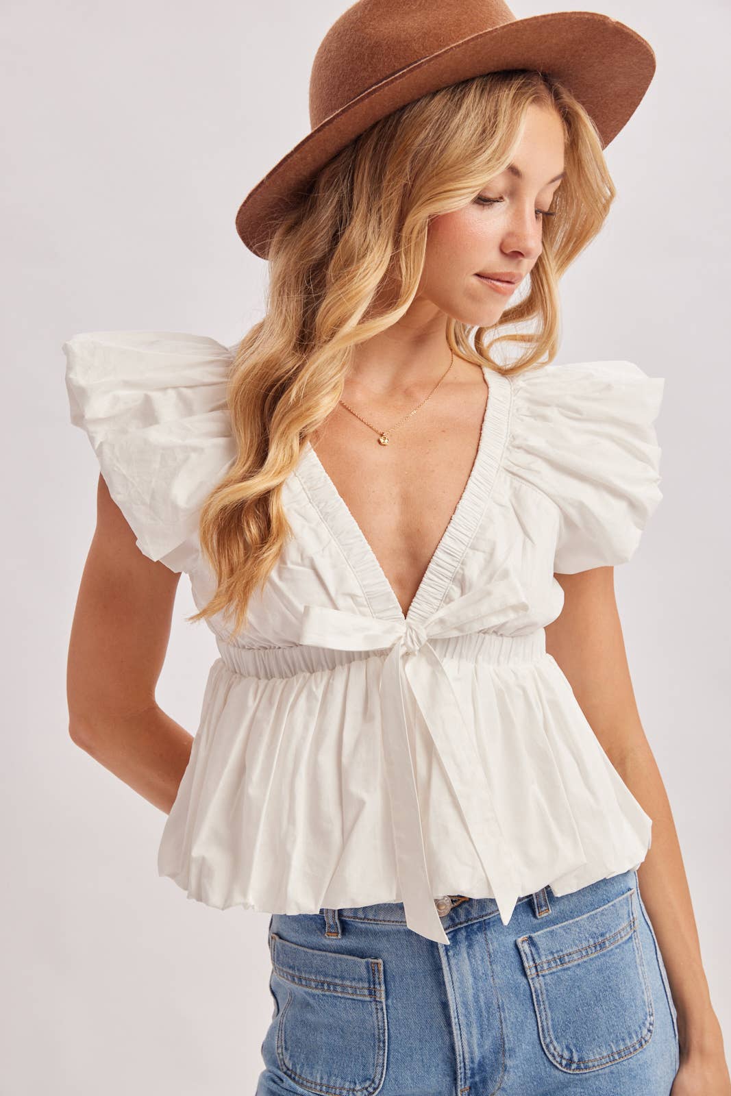 Deep V-Neck Ribbon Front Pleated Peplum Blouse