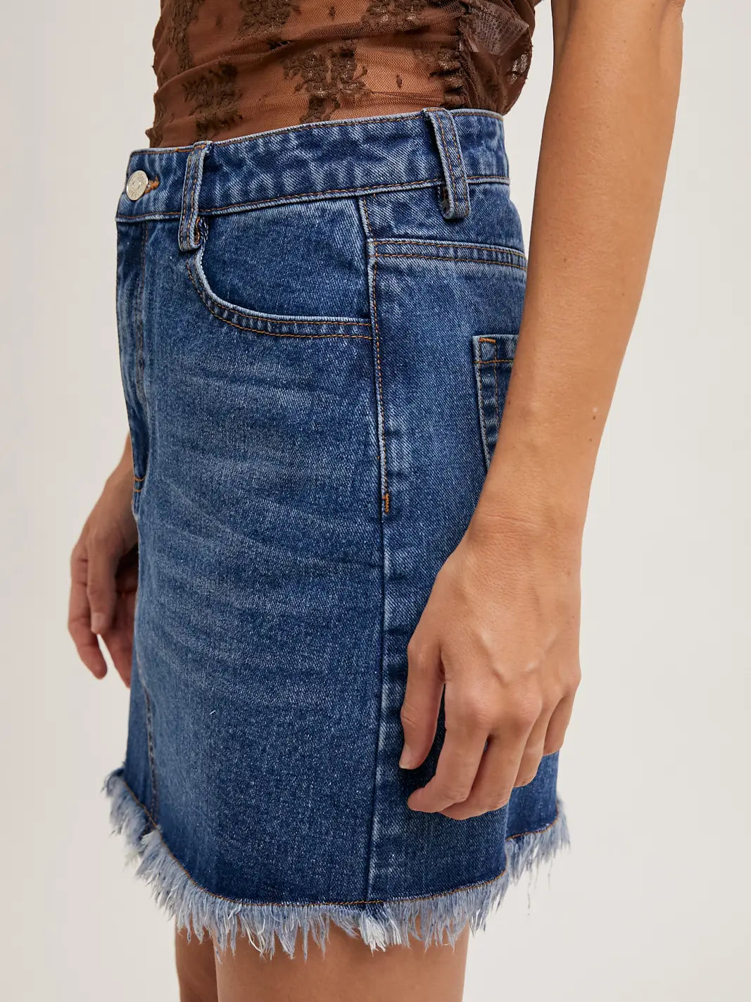 High-Waist Denim Raw Hem Mini Skirt