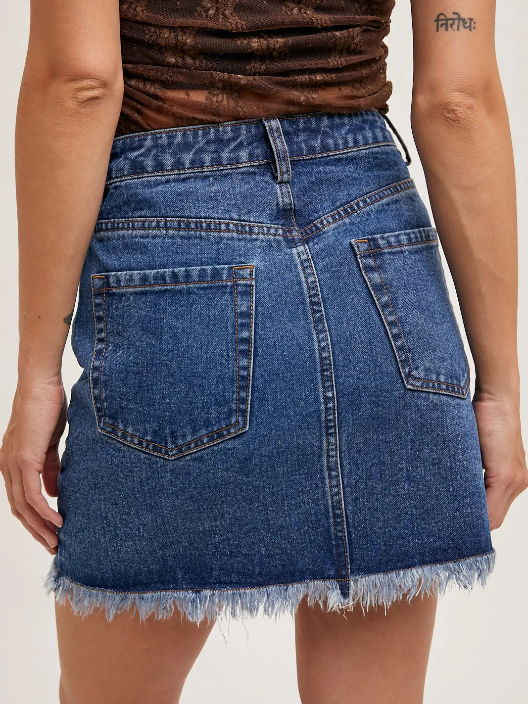 High-Waist Denim Raw Hem Mini Skirt