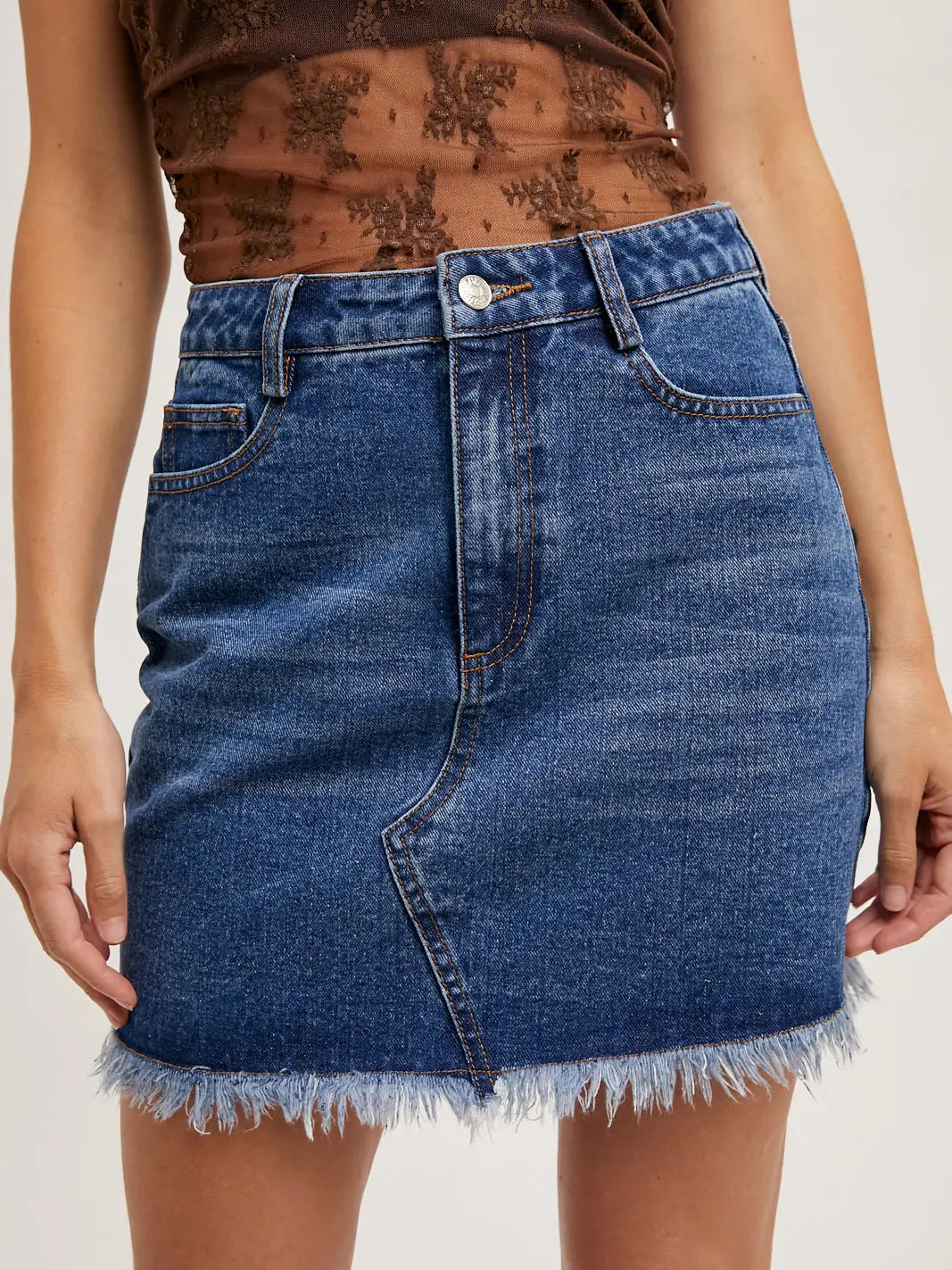 High-Waist Denim Raw Hem Mini Skirt