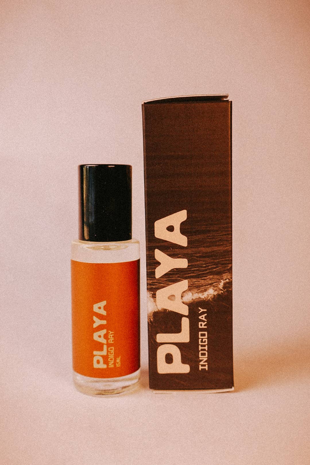 Vegan roll on perfume oil in a travel friendly bottle with earthy western boho branding