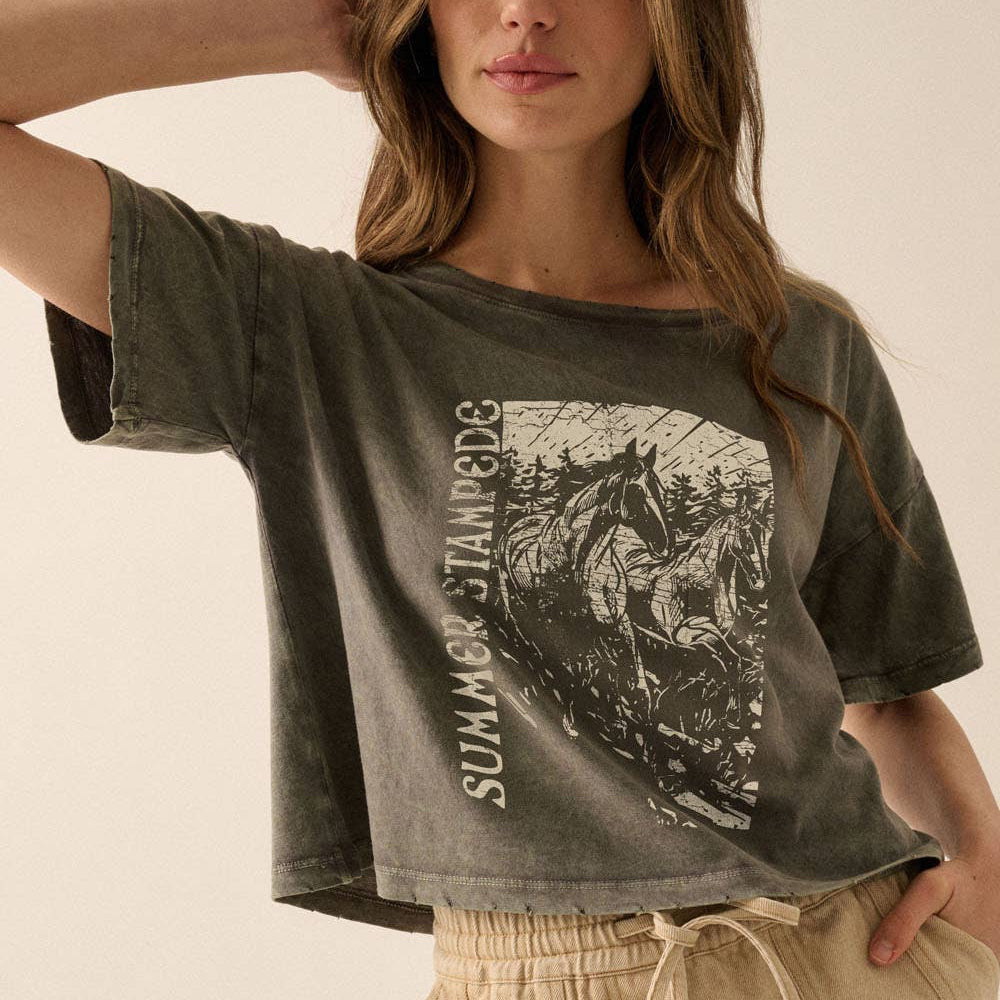 woman wearing cropped graphic tee with western horse print and drawstring lounge pants casual boho outfit