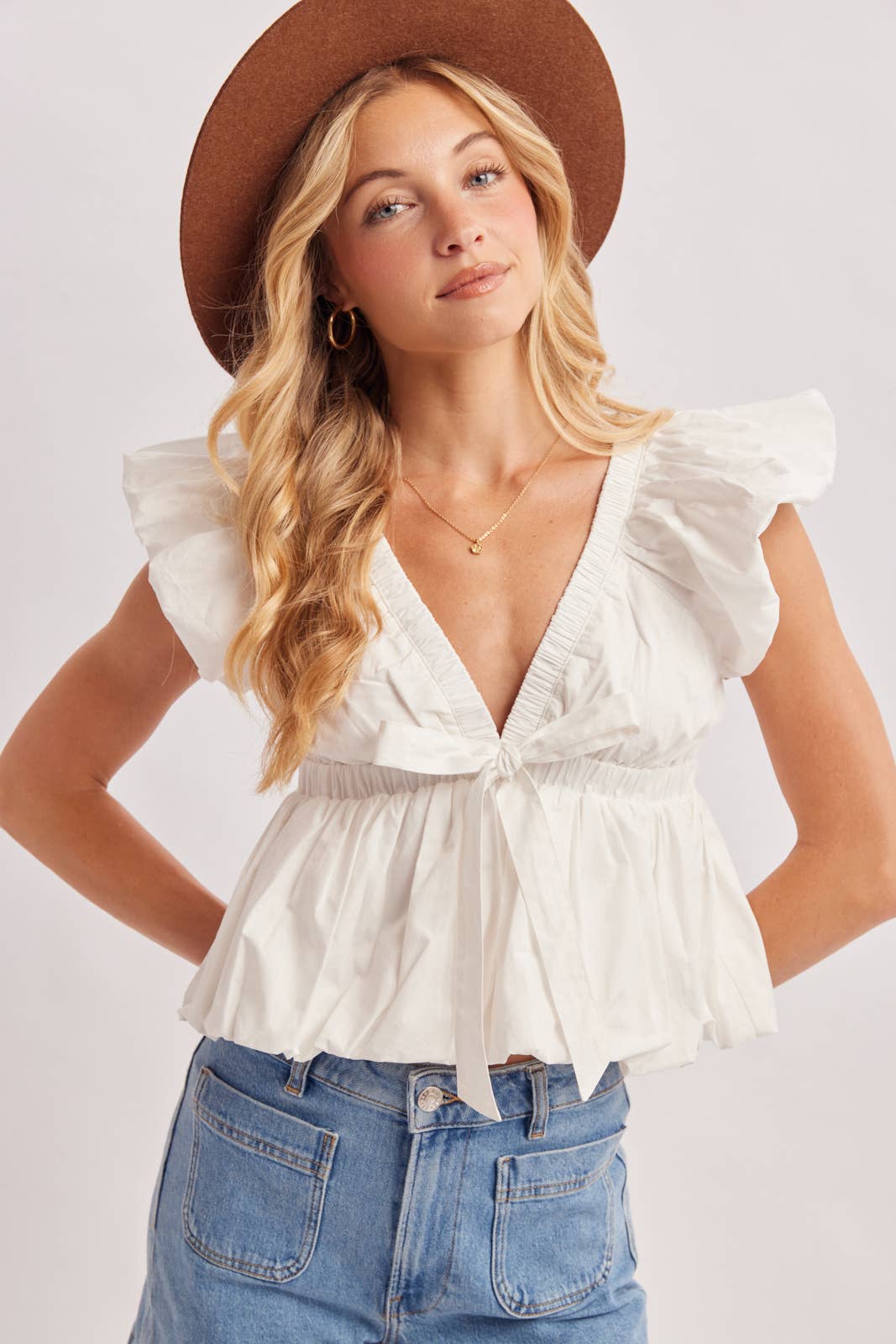 Deep V-Neck Ribbon Front Pleated Peplum Blouse