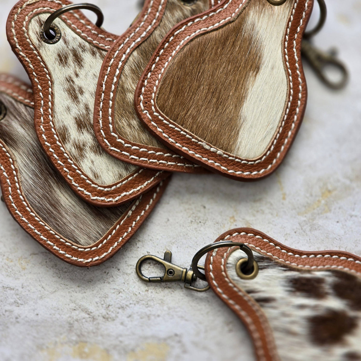 Hair-On Cowhide Keychain – Cow Tag with Leather Borders