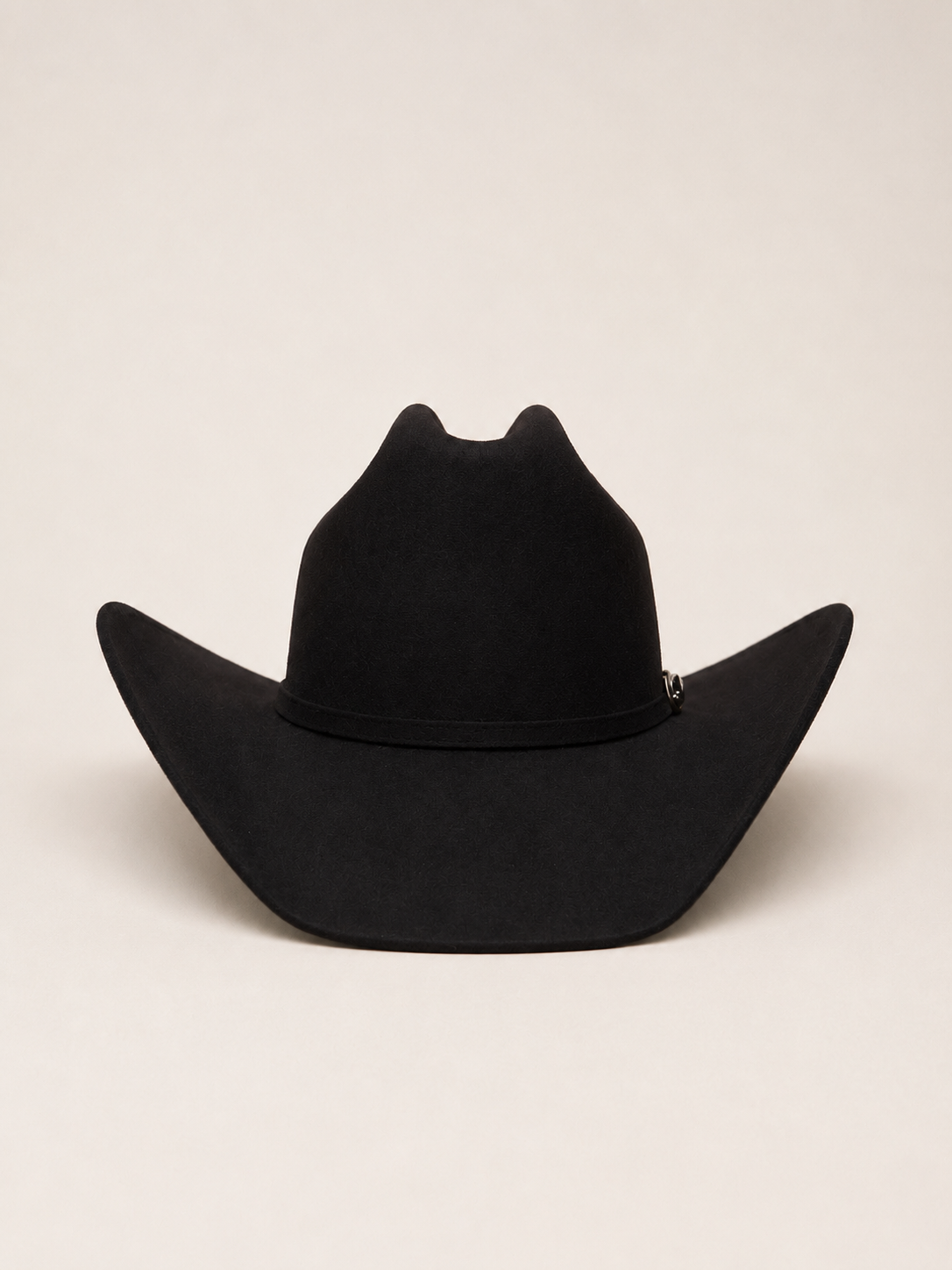 Chocolate brown wool cowboy hat shown from an angled side view