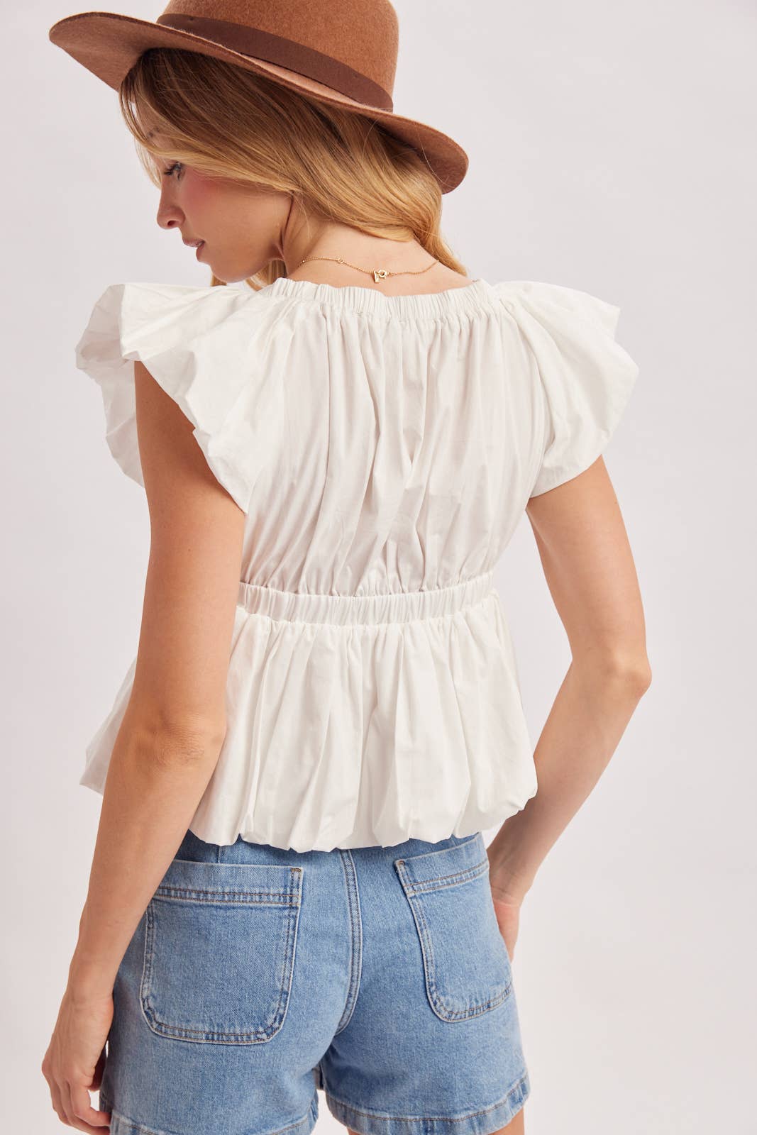 Deep V-Neck Ribbon Front Pleated Peplum Blouse