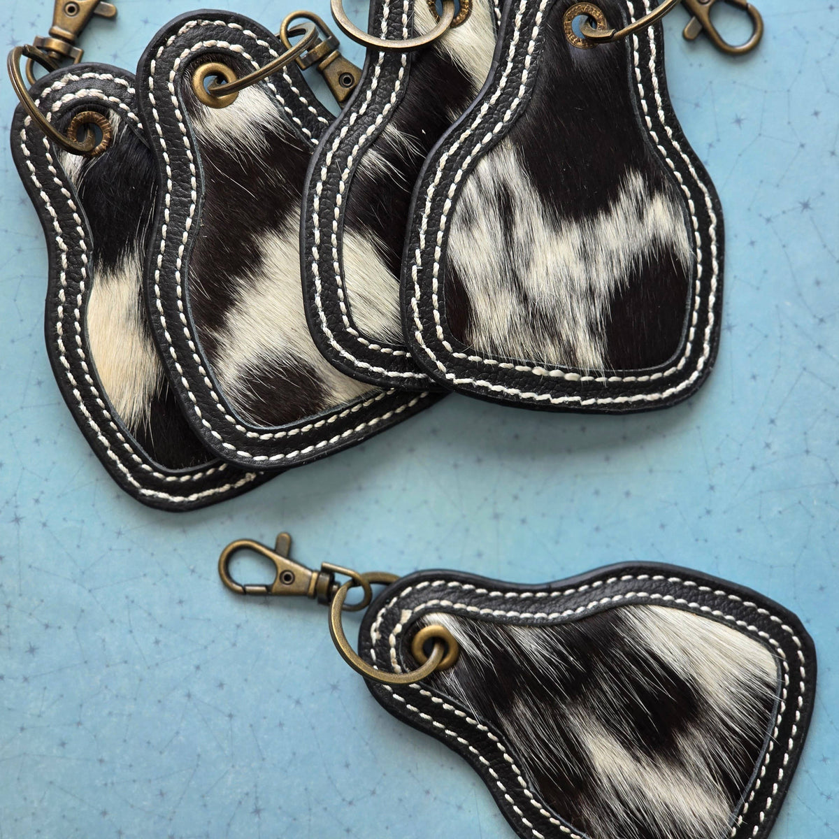 Hair-On Cowhide Keychain – Cow Tag with Leather Borders