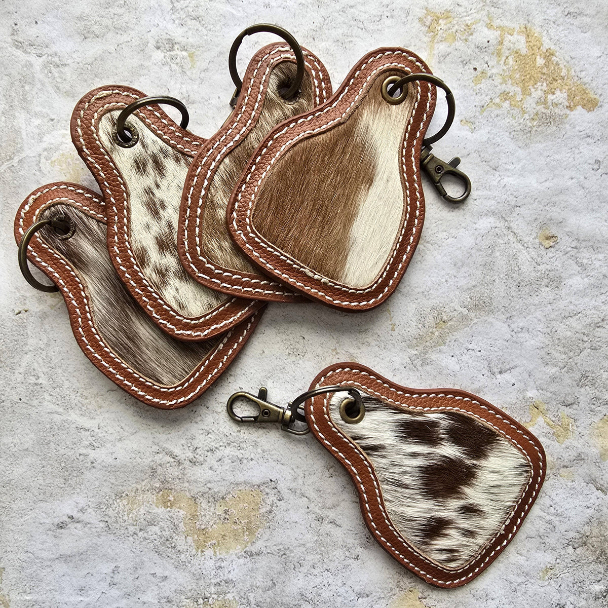 Hair-On Cowhide Keychain – Cow Tag with Leather Borders