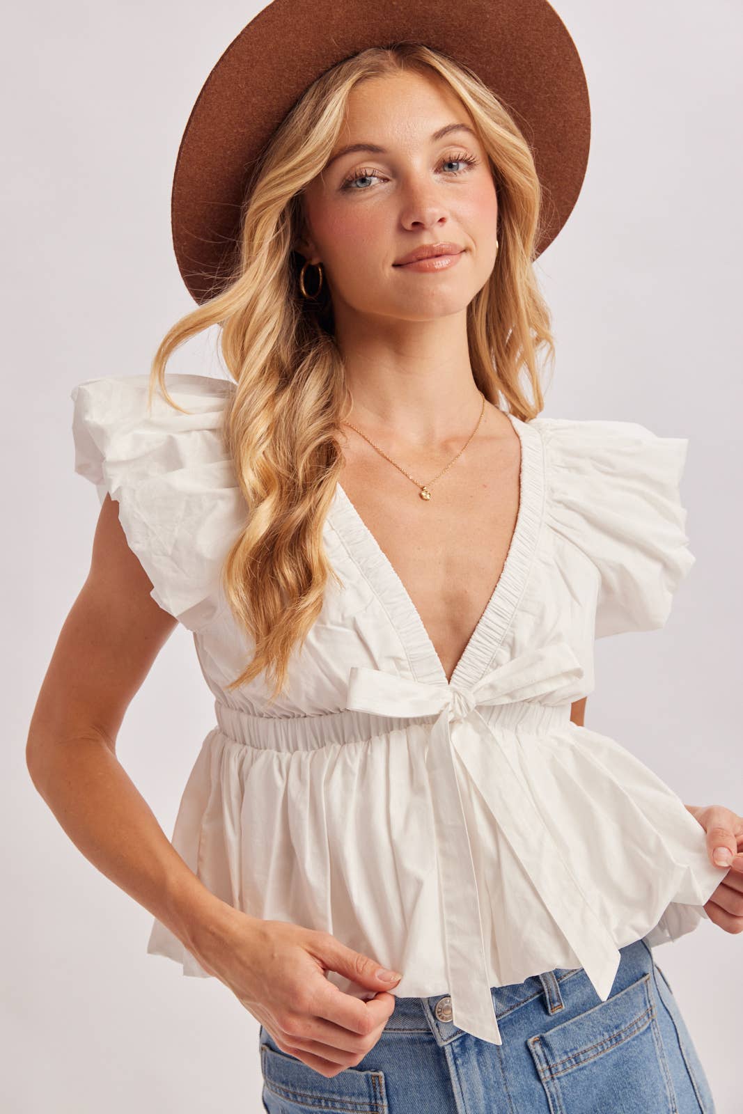 Deep V-Neck Ribbon Front Pleated Peplum Blouse
