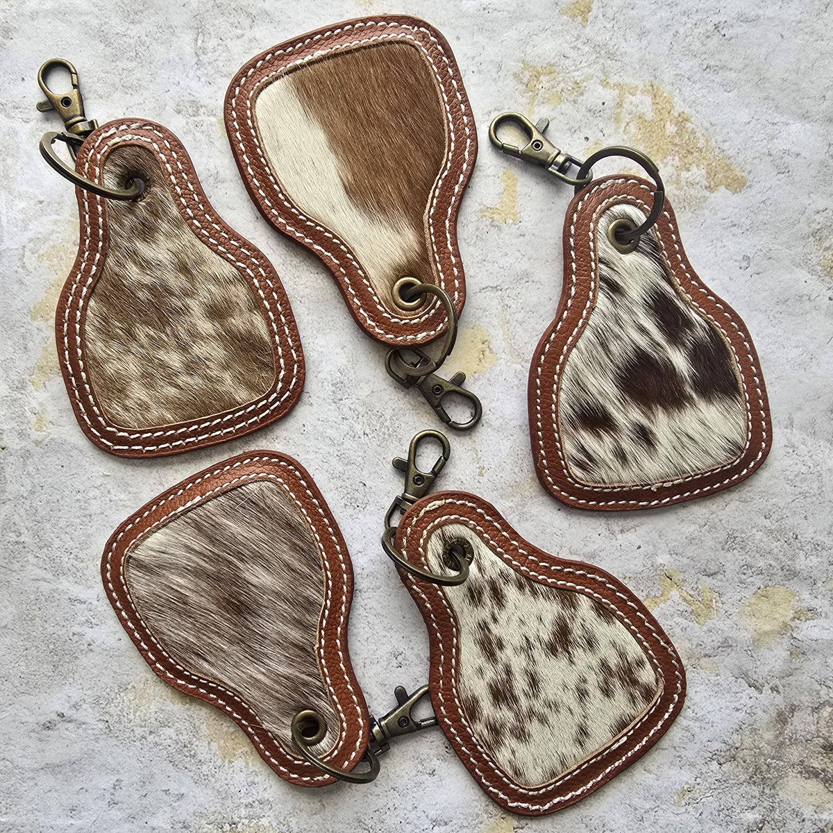 Hair-On Cowhide Keychain – Cow Tag with Leather Borders