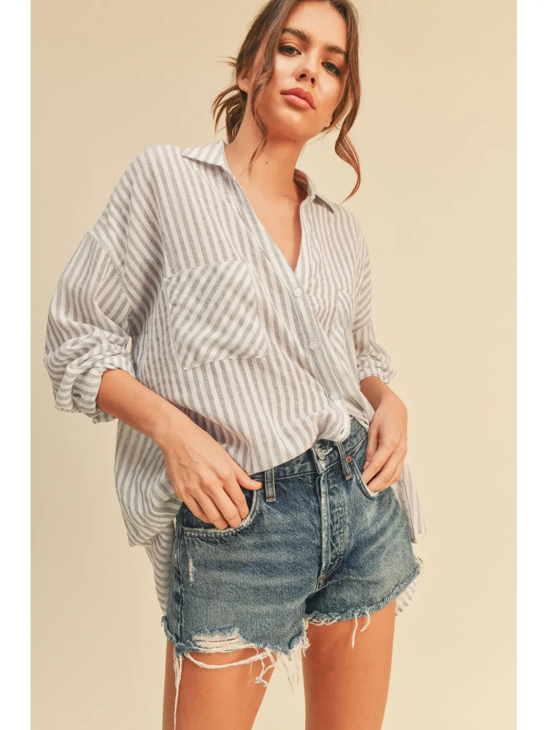 women’s striped button up blouse with distressed denim cutoff shorts relaxed boho casual style Dani California Boutique