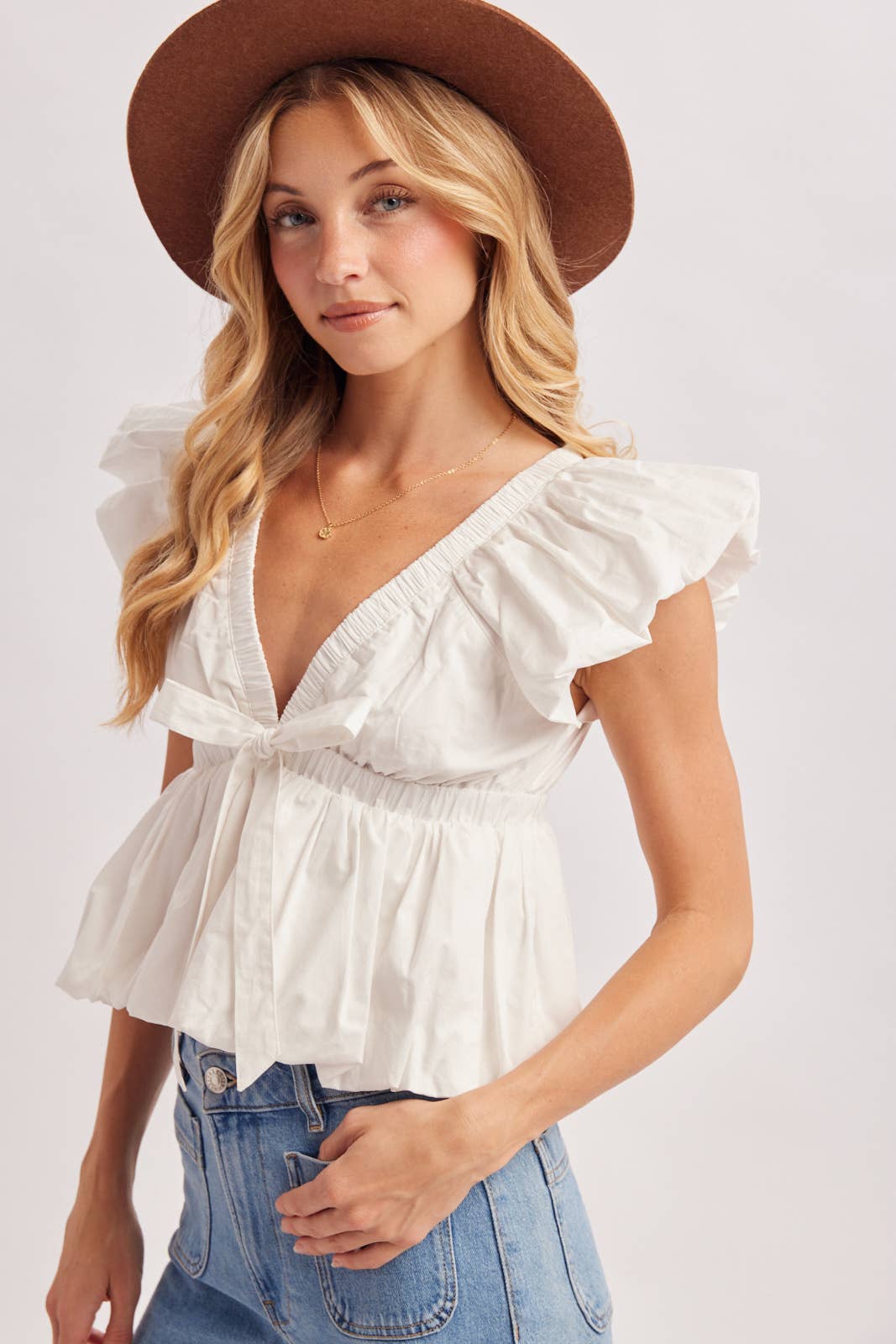 Deep V-Neck Ribbon Front Pleated Peplum Blouse
