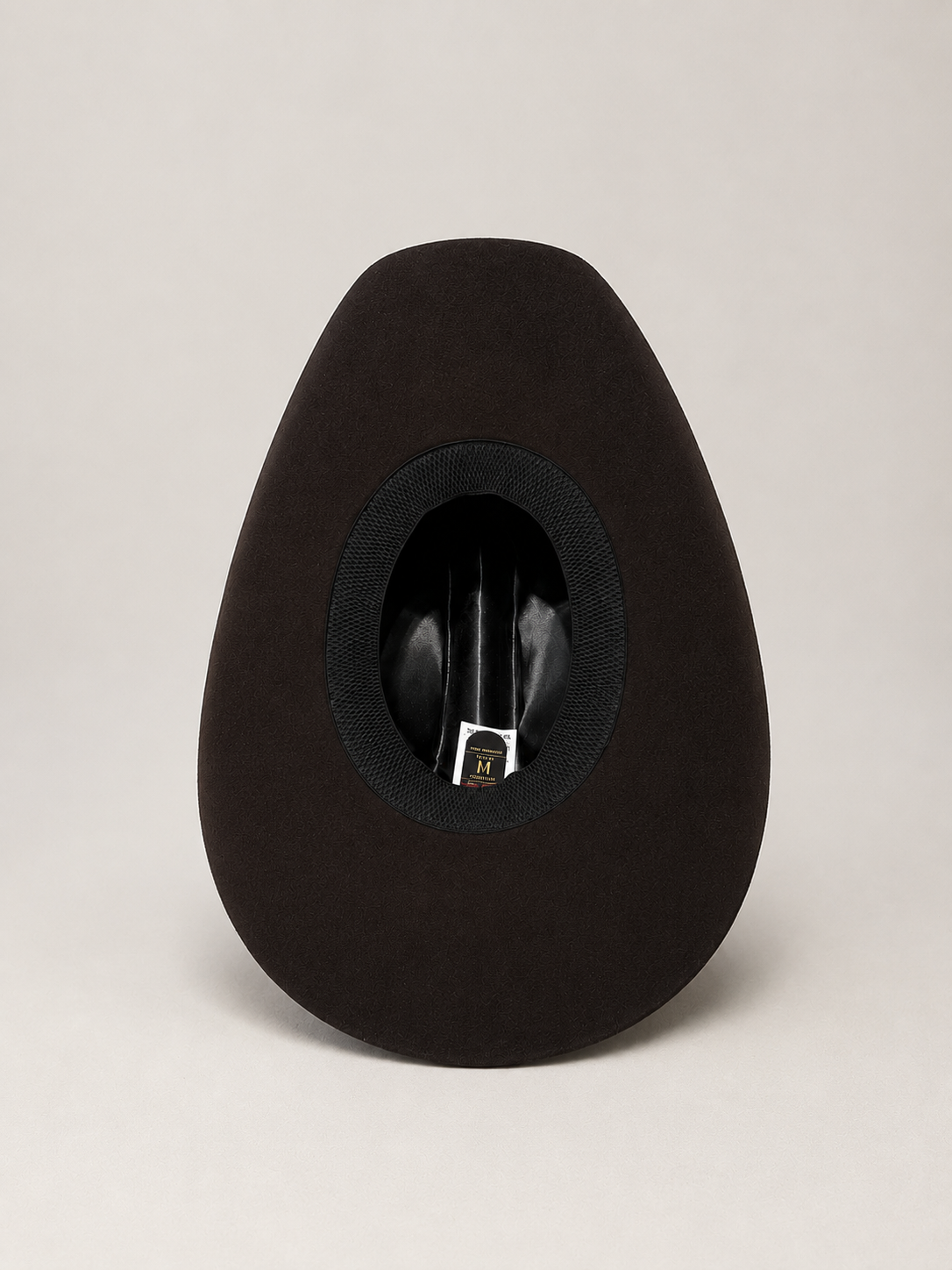 Chocolate premium wool western hat displayed from a second angle